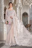 "Maria B Exclusive Saree Collection 2023: Timeless Elegance in Peach"